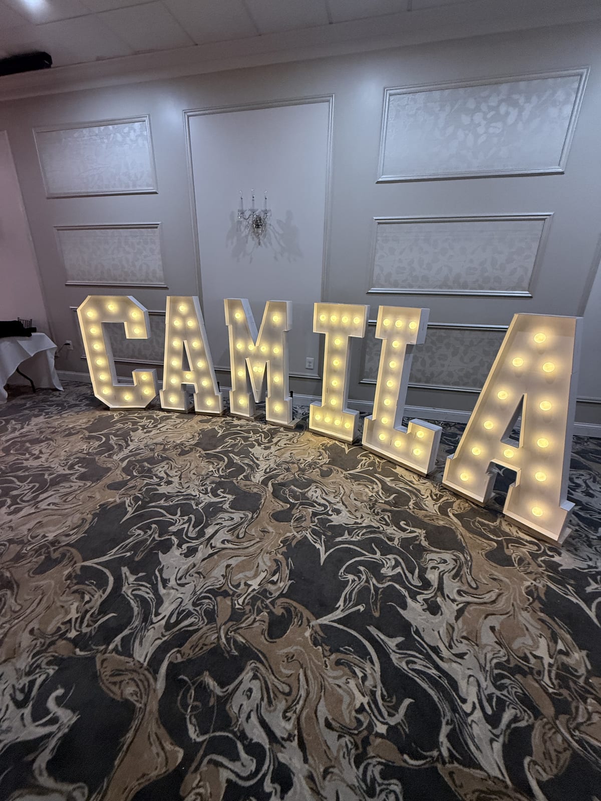 Light-up marquee letters standing at an event